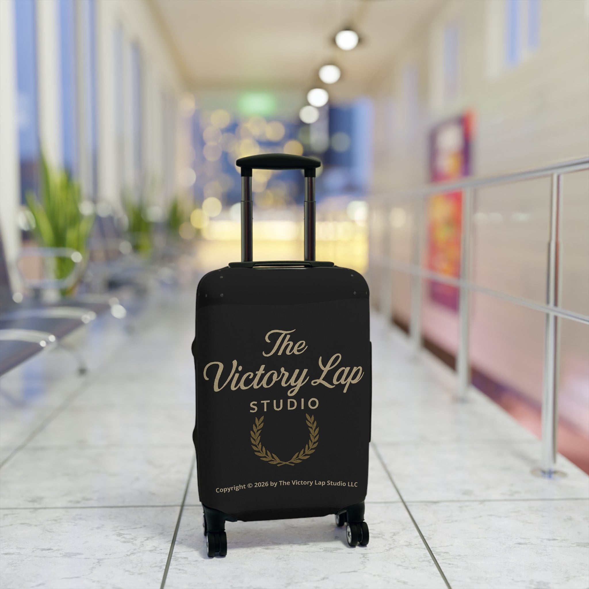 The Victory Lap Studio Protective Travel Suitcase Cover with Laurel Design