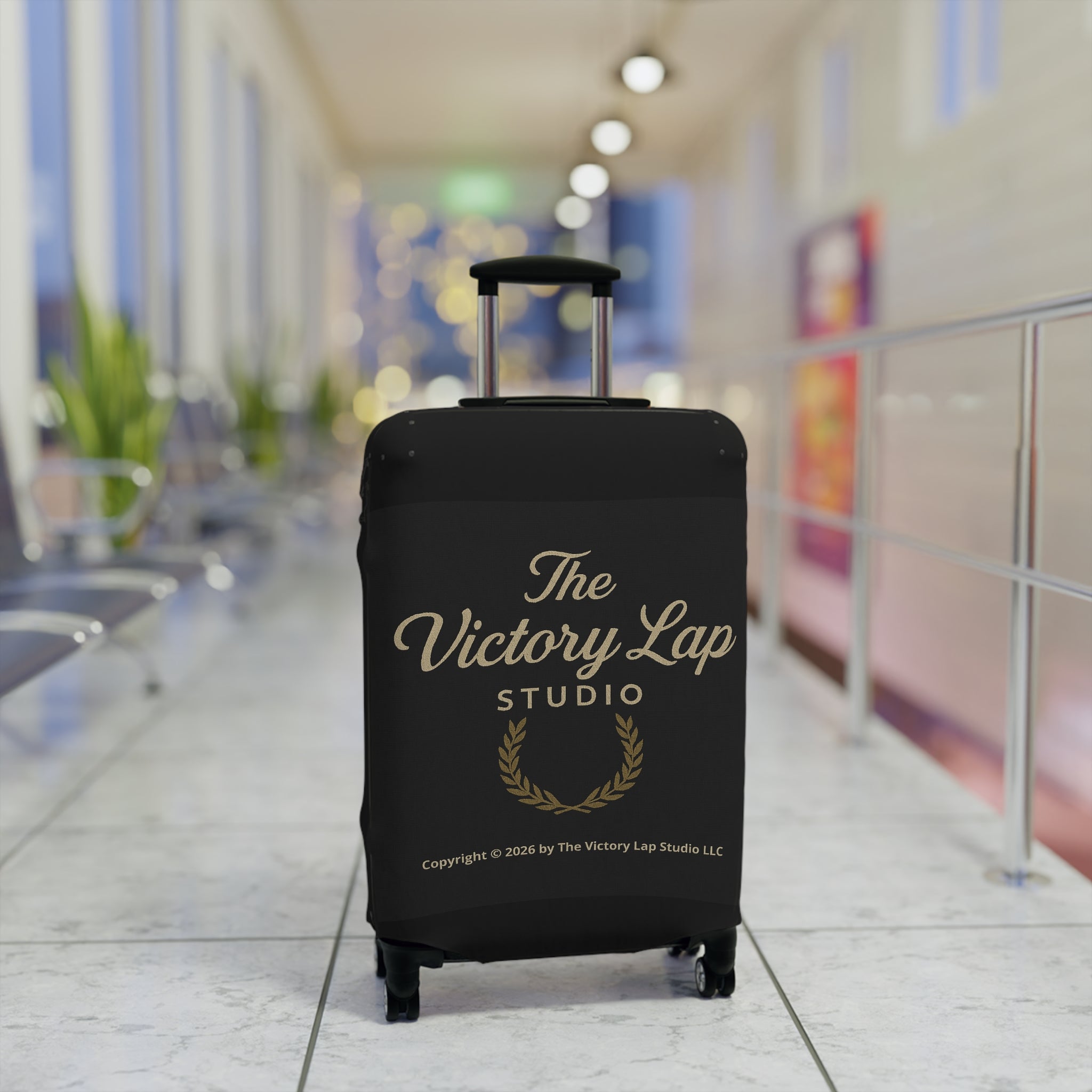 The Victory Lap Studio Protective Travel Suitcase Cover with Laurel Design